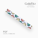 Pastel pink, teal and pale yellow retro shapes with black outlines on a white loom bracelet bead pattern